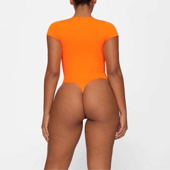 SKIMS NWOT Essential T-Shirt Bodysuit - Orange Highlighter - Picture 2 of 4